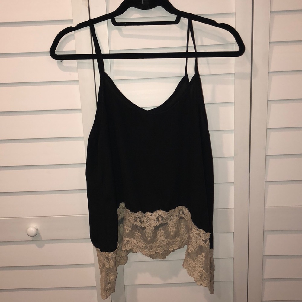 Black tank top with cream crochet trim at bottom